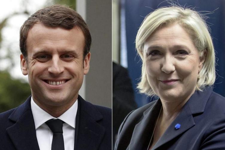 El candidato socioliberal Emmanuel Macron (i) y la ultraderechista Marine Le Pen (d). (EFE)