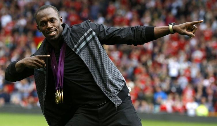 Bolt en Old Trafford: su sueño es jugar en el Manchester United. (Reuter)